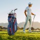 Navy 9.5-inch golf cart bag with 14-way dividers, featuring multiple pockets and a comfortable single strap for easy.