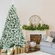 Snow flocked 7.5 feet artificial Christmas tree with 1346 tips, perfect for creating a winter wonderland in your home.