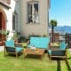 4-piece patio rattan furniture set with turquoise cushions, featuring acacia wood and a large tabletop for outdoor.
