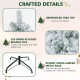 Snow-flocked Christmas tree with 295 branch tips and 150 warm white lights, perfect for festive holiday decor.