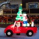 Santa Claus driving a red car with a Christmas tree, snowman, and penguin, 8 feet wide, ideal for festive outdoor.