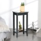 Black 2-tier nightstand with solid wood legs, featuring ample storage for bedroom or living room use.