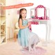 Kids vanity table and stool set with pink polka dot print, featuring a tri-fold mirror for dressing up and ample.