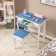 Blue chair from the princess vanity table set featuring a snowflake print, designed for children's makeup and play.