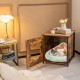 Cat litter box enclosure in brown with a cute cat-shaped hole, featuring a solid metal frame and ventilated design.