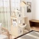 Multi-level cat tree in beige with sisal scratching post, padded perch, and hammock for cats to play and rest.