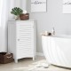 White corner storage cabinet with shutter door and adjustable shelf, perfect for maximizing small bathroom spaces.