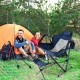 Hammock camping chair in navy with retractable footrest, mesh design, and carrying bag, perfect for outdoor relaxation.