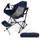 Hammock camping chair in navy with retractable footrest, mesh design for comfort, and carrying bag for easy transport.