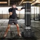 67-inch punching bag with fillable suction cup base, designed for durability and stability during training sessions.