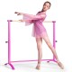 Ballet dancer gracefully practicing at a pink 51-inch ballet barre, designed for stability and adjustable for all.