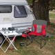 Folding camping directors chair in red with cooler bag and side table, perfect for outdoor use and easy transportation.