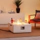 Square 28-inch propane gas fire pit in white terrazzo with lava rocks, perfect for outdoor patio warmth and ambiance.