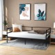 Twin size metal daybed frame in modern style, featuring sturdy slats and under-bed clearance for versatile use in.
