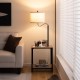 360° rotatable floor lamp with side table, featuring USB charging ports and a cozy linen shade, ideal for living rooms.