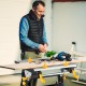 Folding work table showcasing the extendable tabletop and non-slip foot pads, ideal for stable project support.