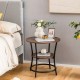 Round end table with brown wood grain top, sturdy metal frame, and open storage shelf, ideal for home or office use.