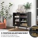 Kitchen buffet sideboard in black with adjustable shelf, wine rack, and sliding glass doors for versatile storage.