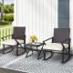 Two wicker rocking chairs with cream cushions and a compact coffee table, perfect for outdoor patio relaxation.