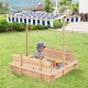 Kids wooden sandbox with blue canopy and bench seats, featuring a bottomless design for ventilation and drainage.
