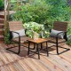 Two rocking chairs with lumbar pillows and a table, made of hand-woven brown PE rattan, perfect for outdoor relaxation.