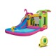 Inflatable bounce castle with long water slide, featuring a pink and green design, perfect for summer fun and play.