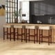 Backless beige upholstered bar stools with solid rubber wood legs, ideal for dining or kitchen use, featuring a.