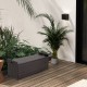 Patio storage bench with seat cushion, made of brown PE rattan, ideal for outdoor seating and storage solutions.