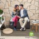 Patio storage bench with seat cushion, made of brown PE rattan, supports 795 lbs, ideal for outdoor seating and storage.