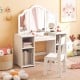 Kids vanity table set featuring a tri-folding mirror and four open cubbies for organized storage, perfect for young.
