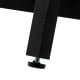 Close-up of the adjustable foot pad of a black upholstered bed frame for enhanced stability and noise reduction.