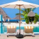 Heavy-duty 20-inch round umbrella base stand, fillable with sand or water, designed for stability in patio or garden.