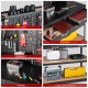 Workbench featuring a pegboard with tools, two drawers, and a large tabletop for versatile project handling.