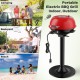 Portable electric BBQ grill in red and black with non-stick rack, ideal for camping, backyard, and beach cooking.