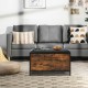 Entryway flip top ottoman stool with padded seat, wood and steel frame, providing storage and comfort for shoe changes.