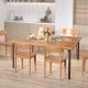 Acacia wood dining table with metal legs, featuring an umbrella hole, perfect for indoor or outdoor dining for six.