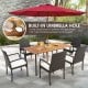 Acacia wood dining table with built-in umbrella hole, metal legs, perfect for outdoor dining with six persons.