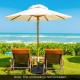 Round outdoor umbrella base made of durable resin with a powder-coated metal pole, ideal for securing patio umbrellas.