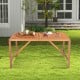 Rectangular 55-inch acacia wood dining table with slatted top and umbrella hole, perfect for outdoor gatherings.