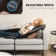 Massage chair pad in black, featuring adjustable width of 3"-5.5" for targeted heat and vibration massage on a sofa.