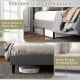 Upholstered platform bed with button tufted headboard, offering under-bed storage space for bedroom organization.