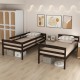 Twin over twin solid wood bunk bed frame in espresso with high guardrails and integrated ladder for children's safety.
