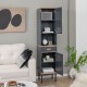 Narrow gray free-standing bathroom cabinet with doors and drawer, featuring adjustable shelves for versatile storage.
