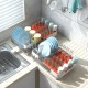Expandable dish drying rack with adjustable dual-part design, featuring removable utensil holder for versatile kitchen.