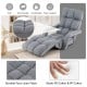 Adjustable gray floor chair with armrests and footrest, made of durable faux linen fabric for versatile comfort.