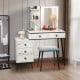 Vanity makeup table set in white with LED lighted mirror, drawers, and cushioned stool for organized beauty essentials.