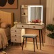 Cushioned stool included with vanity makeup table set, featuring LED lighted mirror and ample storage for cosmetics.