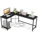 L-shaped black computer desk featuring a wide desktop, adjustable foot pads, and a CPU stand for optimal workspace.