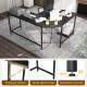 L-shaped black computer desk with power outlets, USB ports, and adjustable foot pads for home office use.
