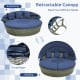 Outdoor PE wicker round daybed with retractable canopy and navy cushions, perfect for sunbathing or reading in the.